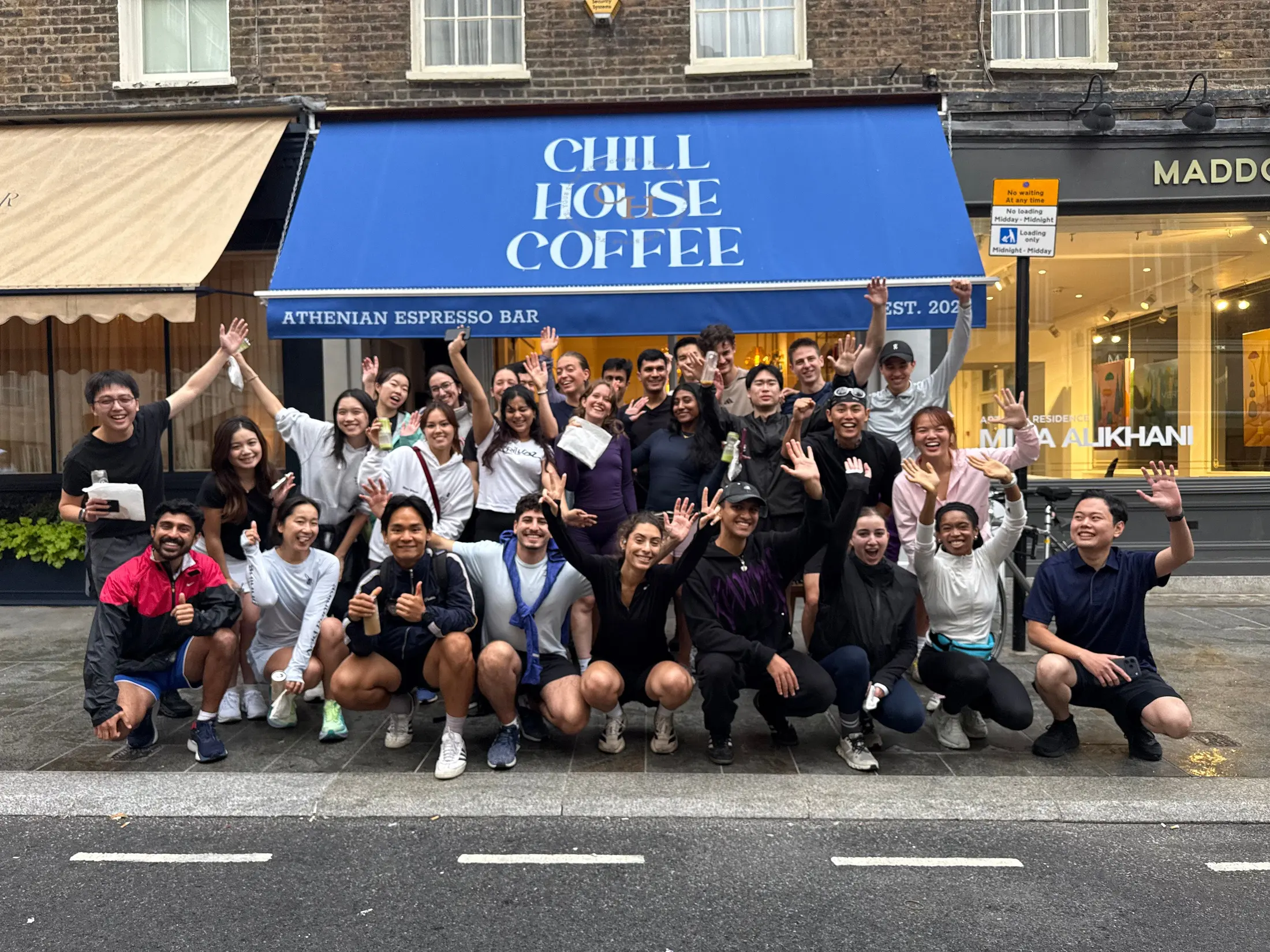 Everybody who ran, in a group outside the cafe afterwards, arms up